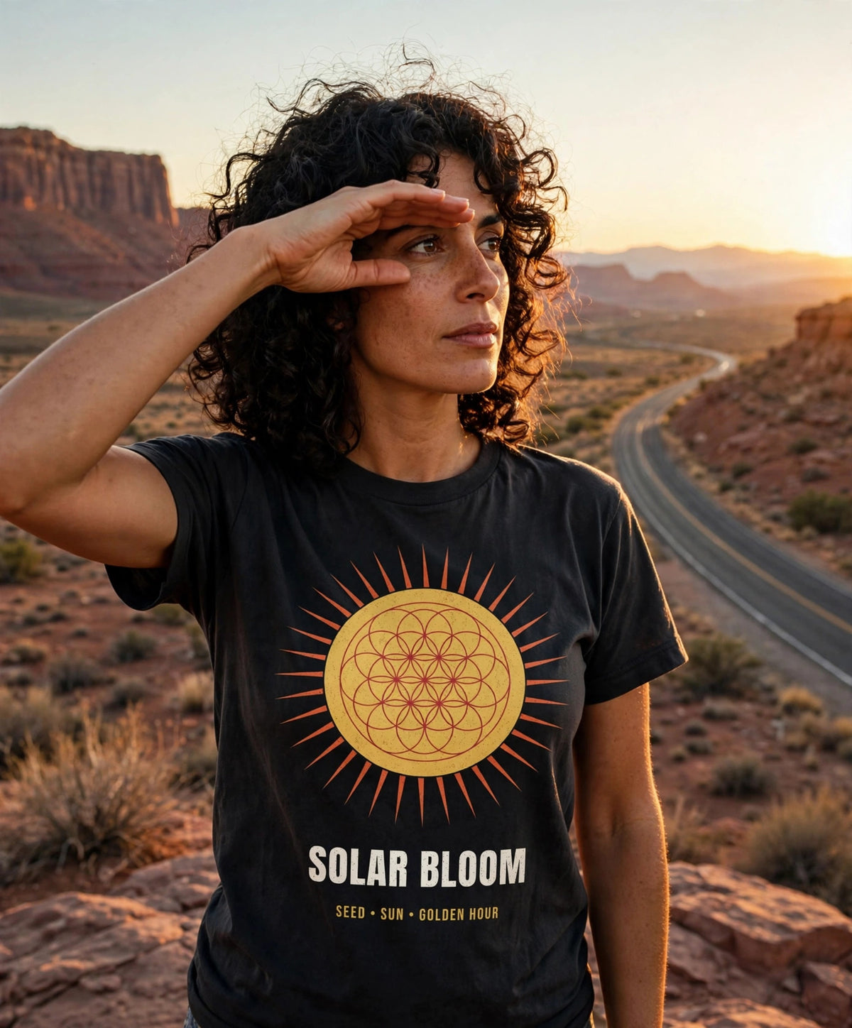 Solar Bloom Tee worn at a desert overlook at sunset