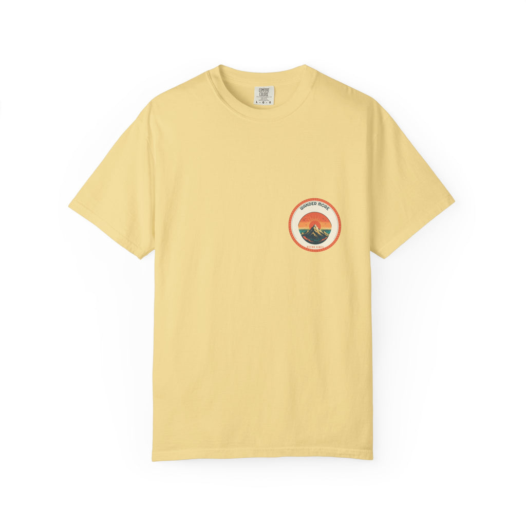 Wander More Patch — a woven-look patch print: a sunlit peak inside a stitched merrow ring, printed on a Comfort Colors 1717 garment-dyed tee by Retro Vibes