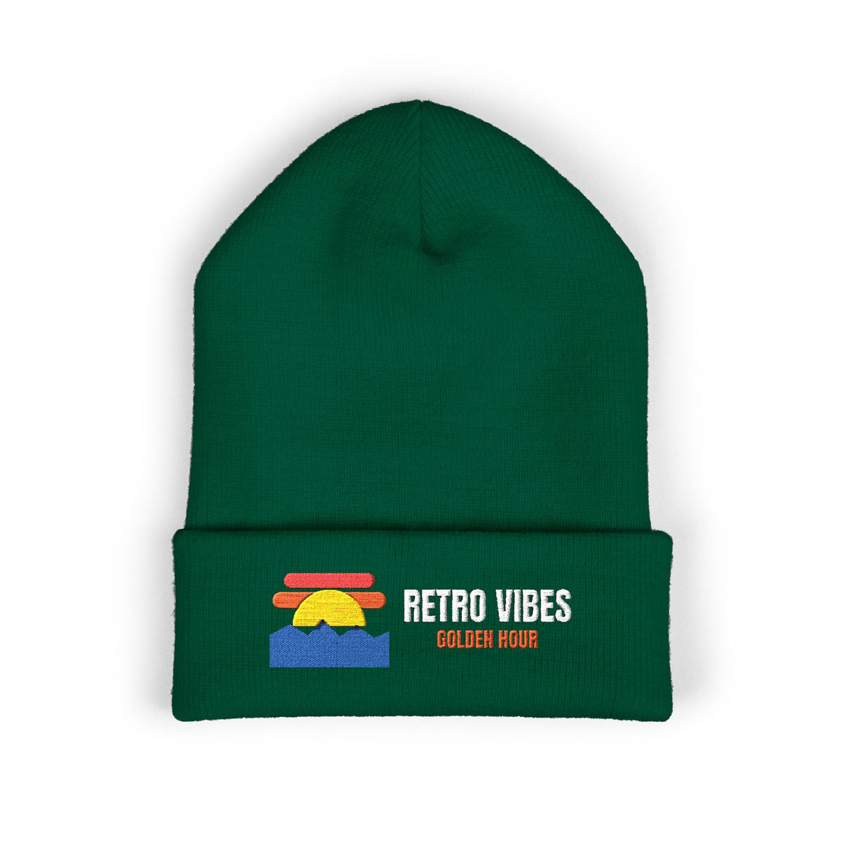 Sun Badge — a Retro Vibes original in the locked 70s palette, simplified for clean embroidery, embroidered on a Yupoong cuffed knit beanie by Retro Vibes