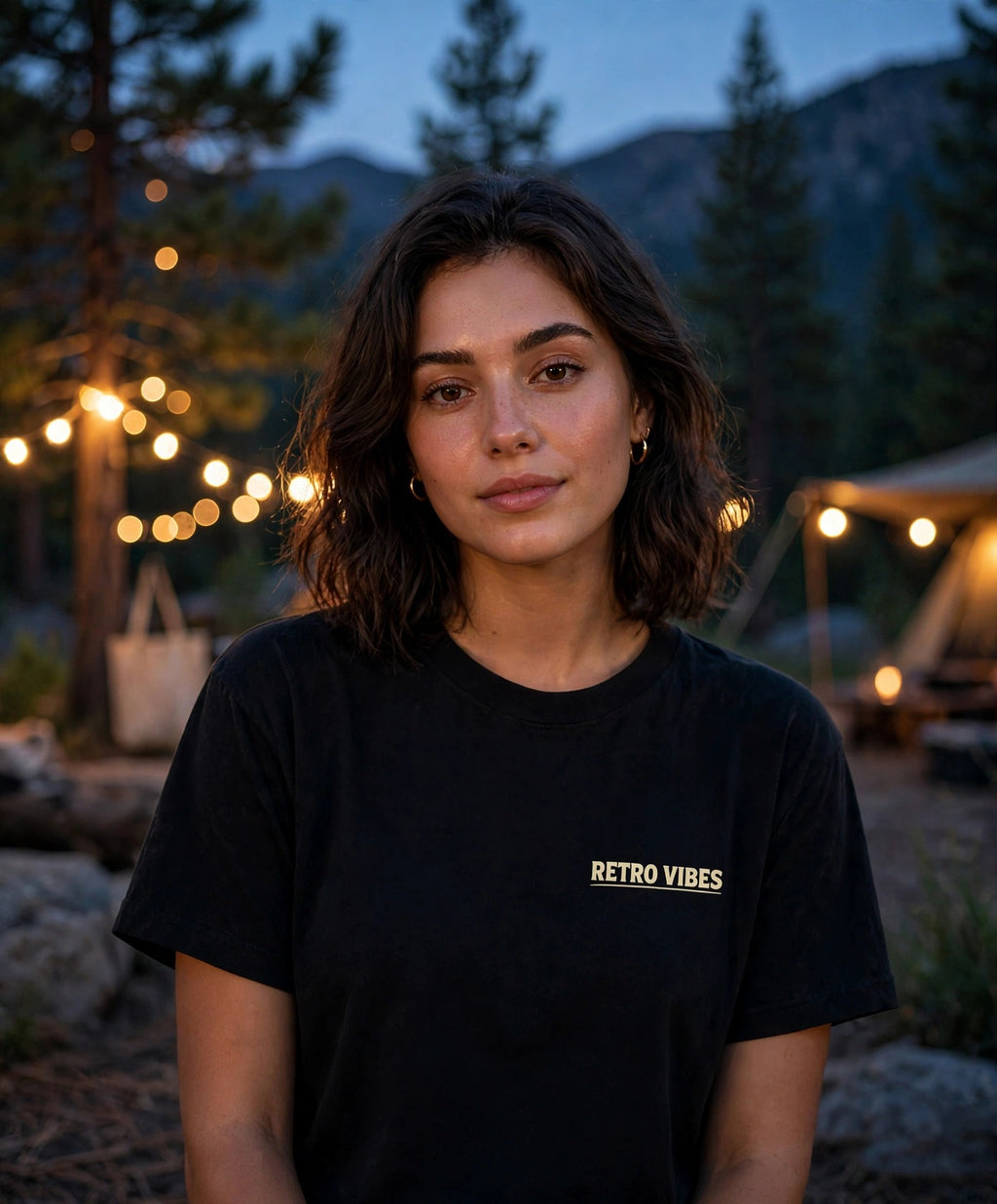 Dark Sky Ridge Tee — model wearing Black, front RETRO VIBES chest wording; design on back